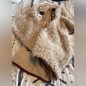 Love tree vest. Brand new with tags. Bought for a queen piece, but never worn.